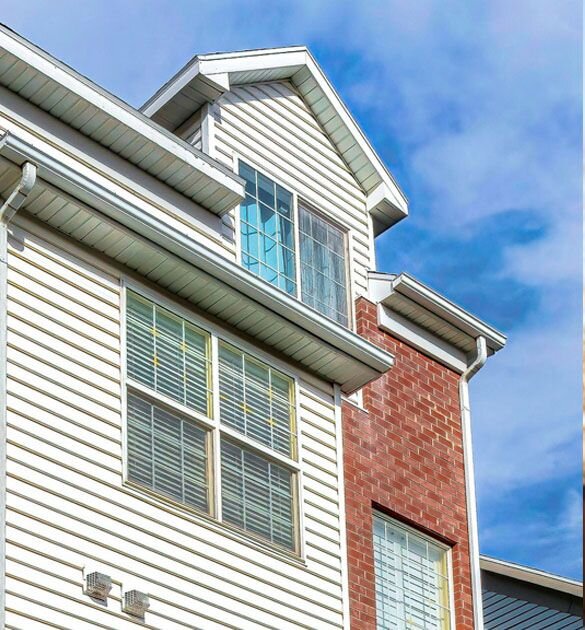 Low shot of a home with new siding